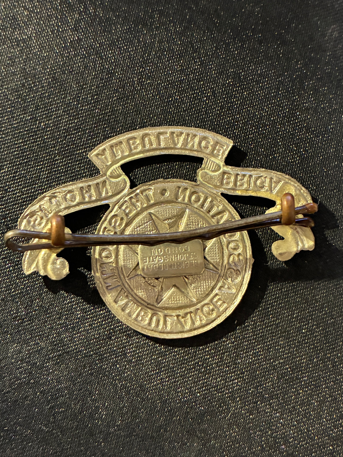 WWII ST JOHNS AMBULANCE BRIGADE CAP BADGE