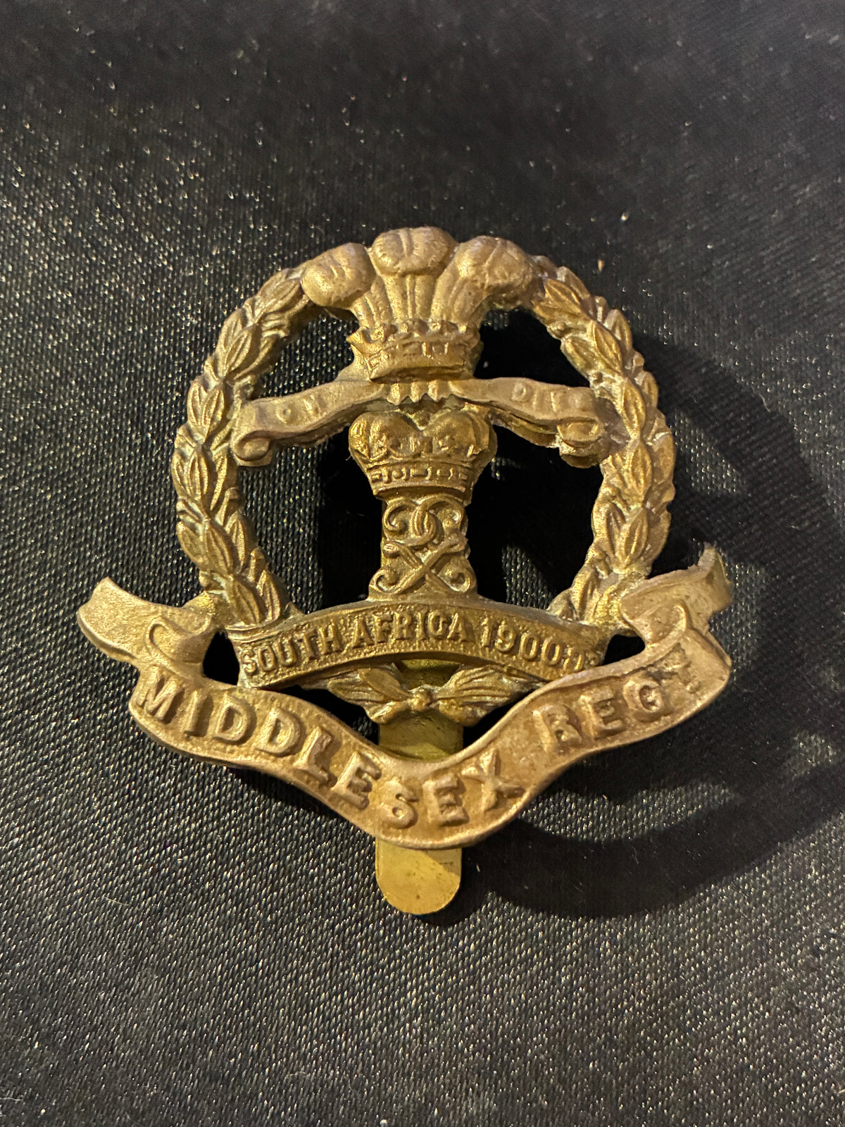 MIDDLESEX REGIMENT SOUTH AFRICA CAP BADGE
